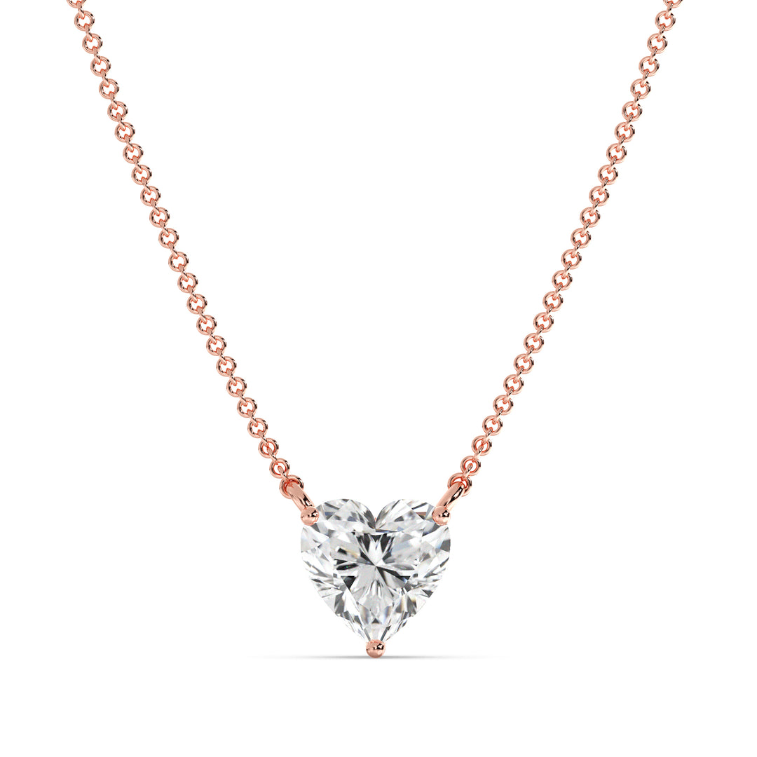 An image of the 2.00 Carat Heart-Shaped Lab-Grown Diamond Solitaire Pendant Necklace in 18K Rose Gold. The pendant showcases a radiant IGI Certified heart-cut diamond with E color and VS clarity, complemented by the warm, romantic hue of rose gold and a fine chain