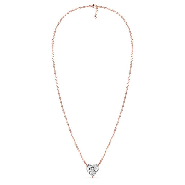 An image of the 2.00 Carat Heart-Shaped Lab-Grown Diamond Solitaire Pendant Necklace in 18K Rose Gold. The pendant showcases a radiant IGI Certified heart-cut diamond with E color and VS clarity, complemented by the warm, romantic hue of rose gold and a fine chain