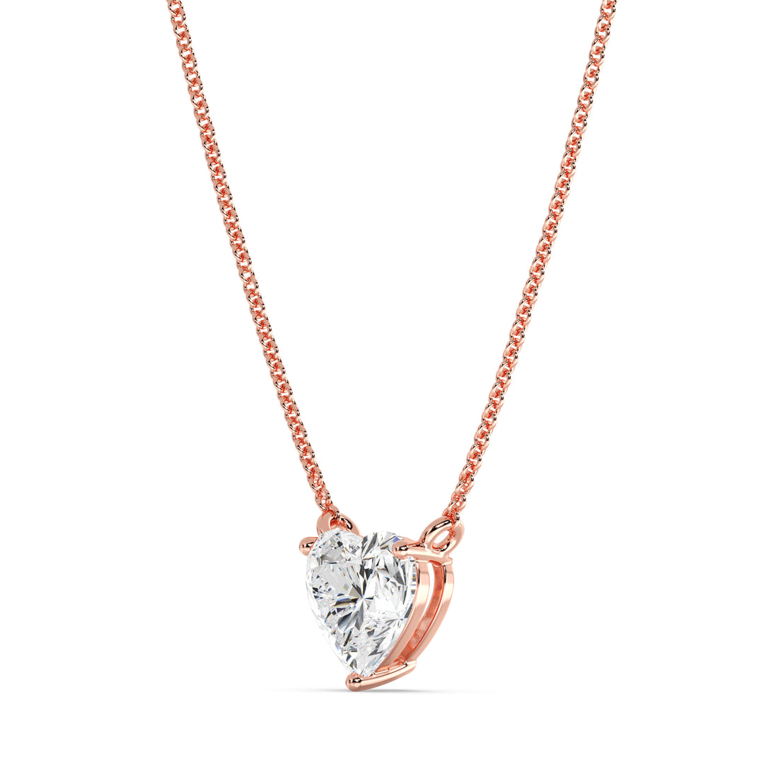 An image of the 2.00 Carat Heart-Shaped Lab-Grown Diamond Solitaire Pendant Necklace in 18K Rose Gold. The pendant showcases a radiant IGI Certified heart-cut diamond with E color and VS clarity, complemented by the warm, romantic hue of rose gold and a fine chain