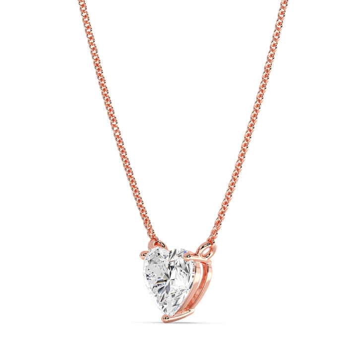 An image of the 2.00 Carat Heart-Shaped Lab-Grown Diamond Solitaire Pendant Necklace in 18K Rose Gold. The pendant showcases a radiant IGI Certified heart-cut diamond with E color and VS clarity, complemented by the warm, romantic hue of rose gold and a fine chain