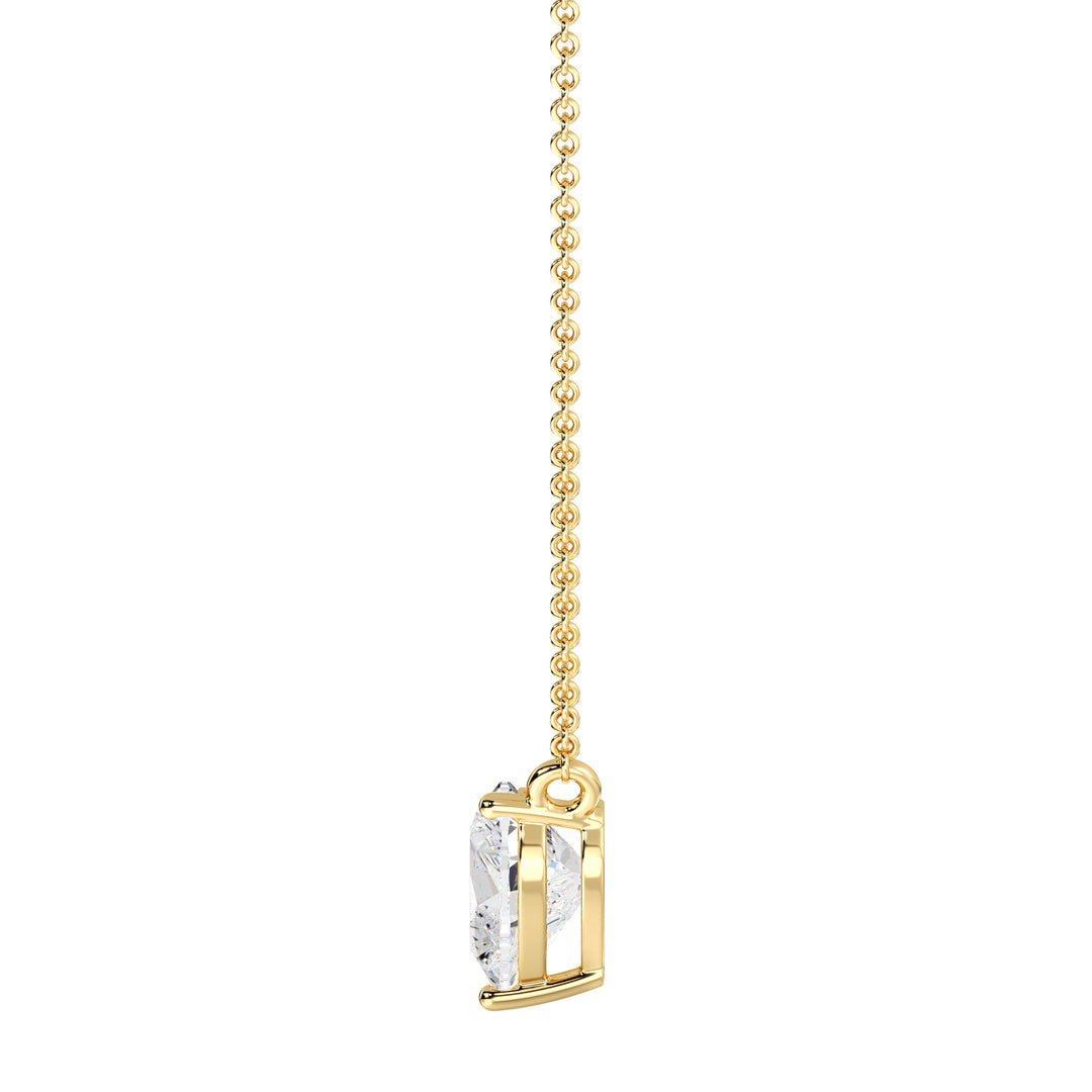 An image of the 2.00 Carat Heart-Shaped Lab-Grown Diamond Solitaire Pendant Necklace in 18K Yellow Gold. The pendant features a dazzling IGI Certified heart-cut diamond with E color and VS clarity, set in a secure prong setting, paired with a delicate chain for a timeless and elegant look