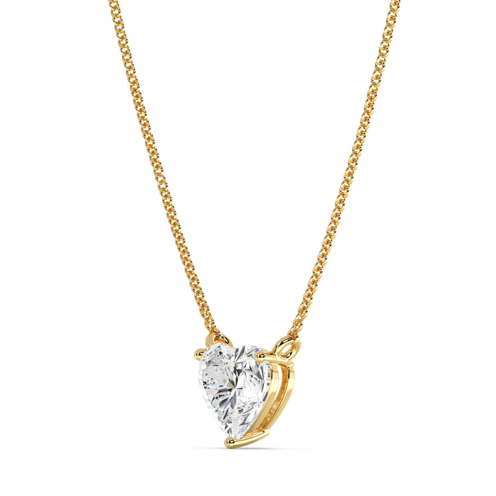 An image of the 2.00 Carat Heart-Shaped Lab-Grown Diamond Solitaire Pendant Necklace in 18K Yellow Gold. The pendant features a dazzling IGI Certified heart-cut diamond with E color and VS clarity, set in a secure prong setting, paired with a delicate chain for a timeless and elegant look