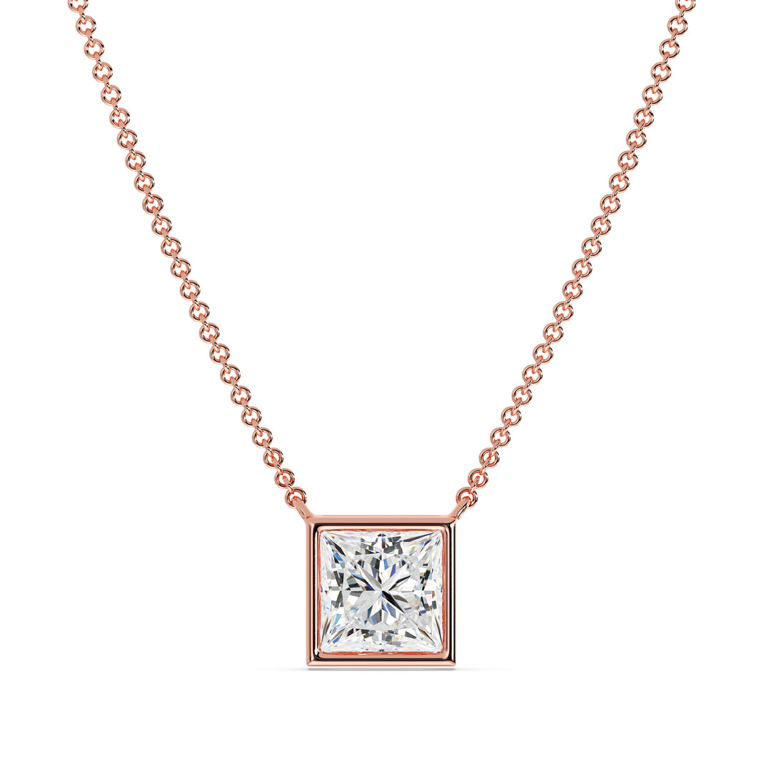 A luxurious 2 Carat Princess-Cut Lab-Grown Diamond Bezel-Set Pendant Necklace in elegant 18K Rose Gold. The E/VS IGI-Certified diamond radiates brilliance, beautifully accentuated by the romantic pinkish-gold tone of the chain and pendant