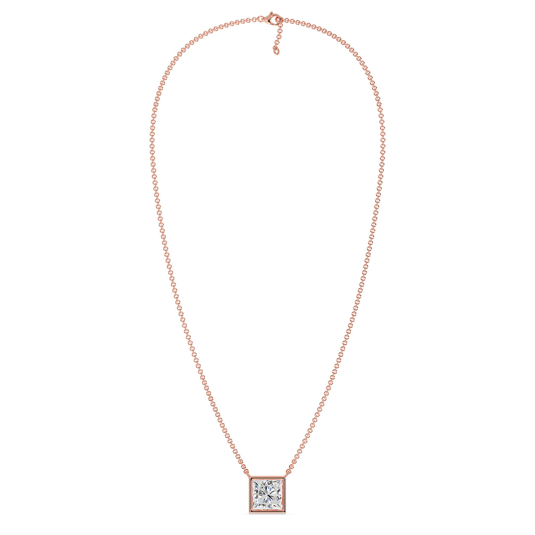 A luxurious 2 Carat Princess-Cut Lab-Grown Diamond Bezel-Set Pendant Necklace in elegant 18K Rose Gold. The E/VS IGI-Certified diamond radiates brilliance, beautifully accentuated by the romantic pinkish-gold tone of the chain and pendant
