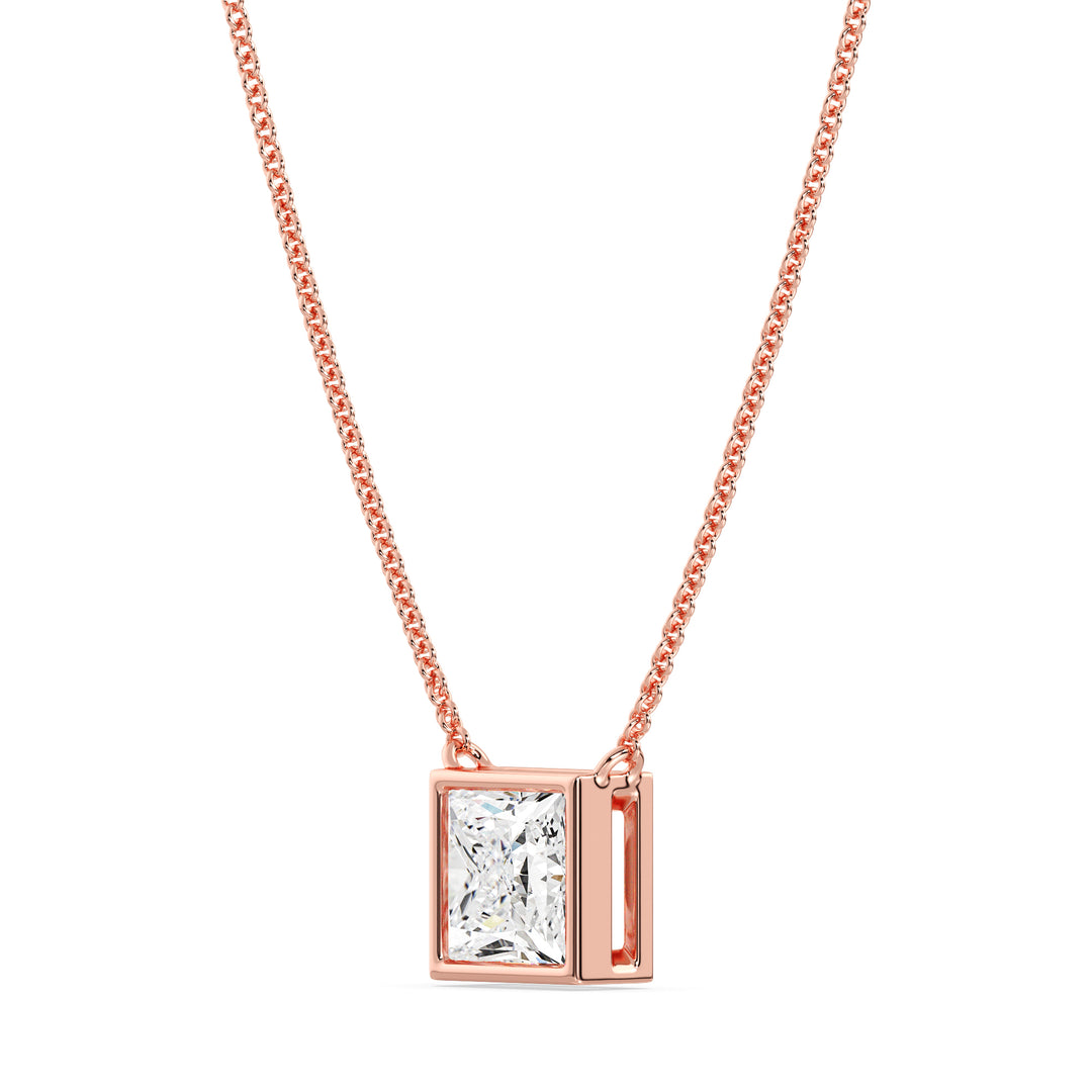 A luxurious 2 Carat Princess-Cut Lab-Grown Diamond Bezel-Set Pendant Necklace in elegant 18K Rose Gold. The E/VS IGI-Certified diamond radiates brilliance, beautifully accentuated by the romantic pinkish-gold tone of the chain and pendant