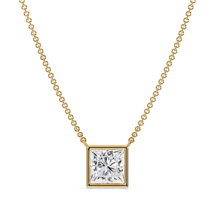 A stunning 2 Carat Princess-Cut Lab-Grown Diamond Bezel-Set Pendant Necklace in vibrant 18K Yellow Gold. The dazzling E/VS IGI-Certified diamond is securely set in a sleek bezel setting, complemented by the warm golden hue of the chain and pendant