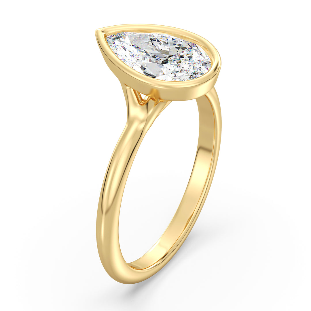 Elegant Pear-Cut Bezel-Set Lab-Grown Diamond Solitaire Ring in 18K Yellow Gold – Available in 1ct, 2ct, 3ct, and 4ct