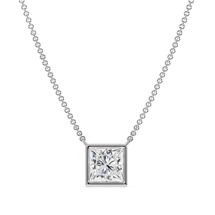 A sophisticated 2 Carat Princess-Cut Lab-Grown Diamond Bezel-Set Pendant Necklace in polished 18K White Gold. The E/VS IGI-Certified diamond sparkles brilliantly, framed by the sleek and modern white gold chain and pendant.