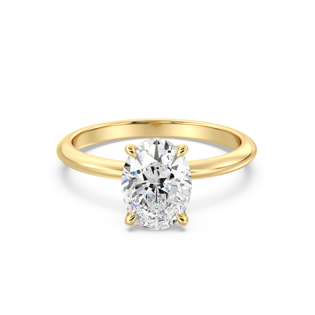 Timeless 4-Claw Oval Lab-Grown Diamond Solitaire Engagement Ring in 18K Yellow Gold, featuring a radiant oval-cut diamond with exceptional brilliance.